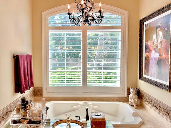 Elegant and timeless? Yes, please! We love how these shutters maintain ample privacy in this charming Hilton Head Island bathroom, while adding a decorative twist. Even shutters can be customized to fit any window shape in your home and can also come motorized for simple use.