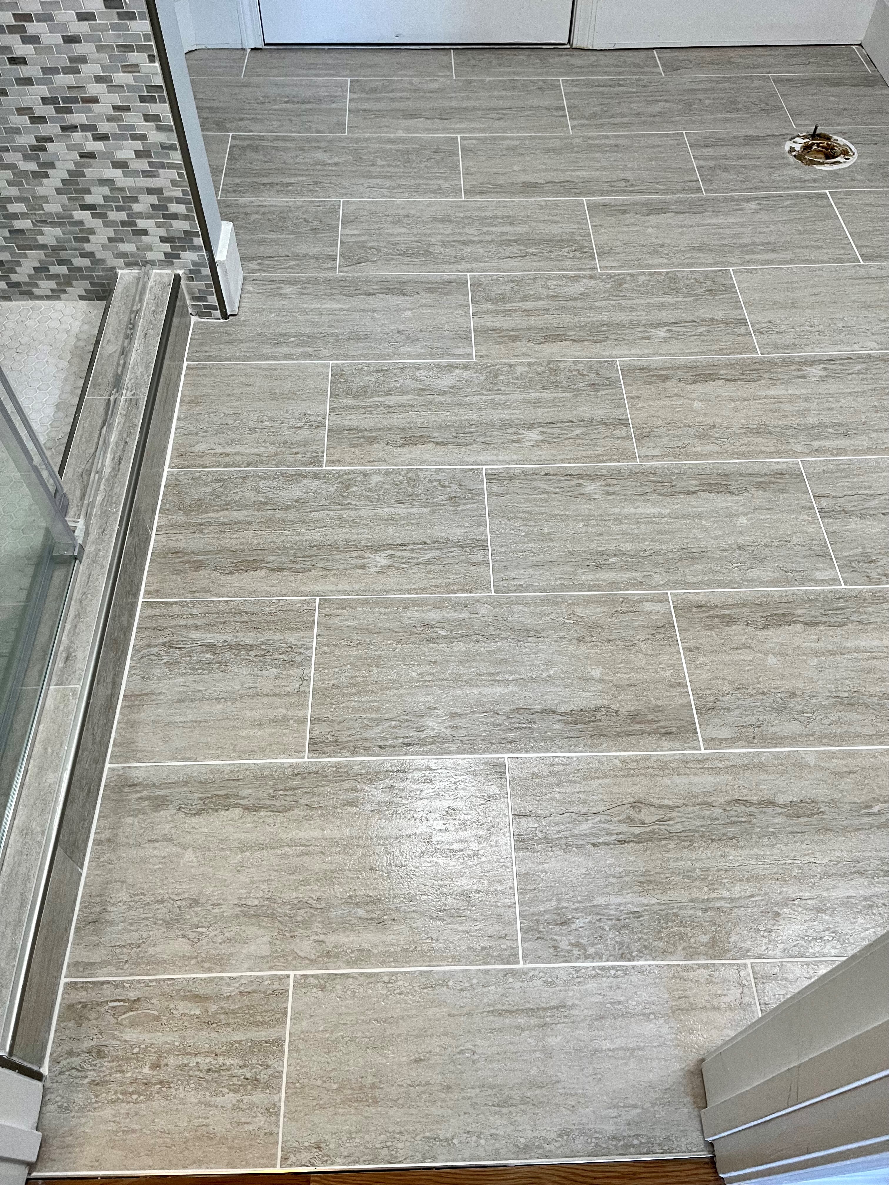 Breath  new life into your bathroom and remodel with new floor tiles.