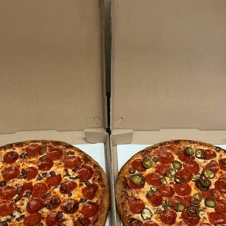Two Large Pizzas with Two Toppings on Each and an Order of Breadsticks