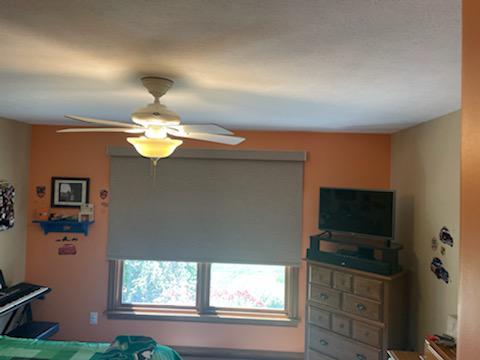 Here's a before and after from Mooresville! Before, we had a very sunny window. After our Roller Shades were installed, we have a shady, comfortable living space!