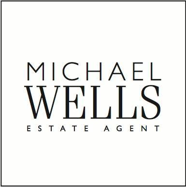 Michael J. Wells - Premier Estate Properties Photo