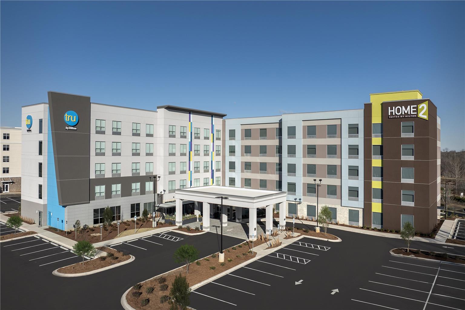 Home2 Suites by Hilton Concord Charlotte Logo