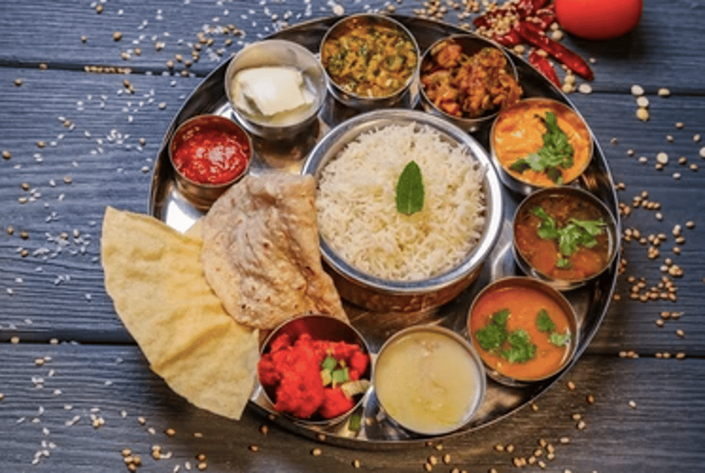 Chicken Tikka Masala Combo (Chicken Tikka Masala, Naan, Samosa, Rice, Dessert, Soda)