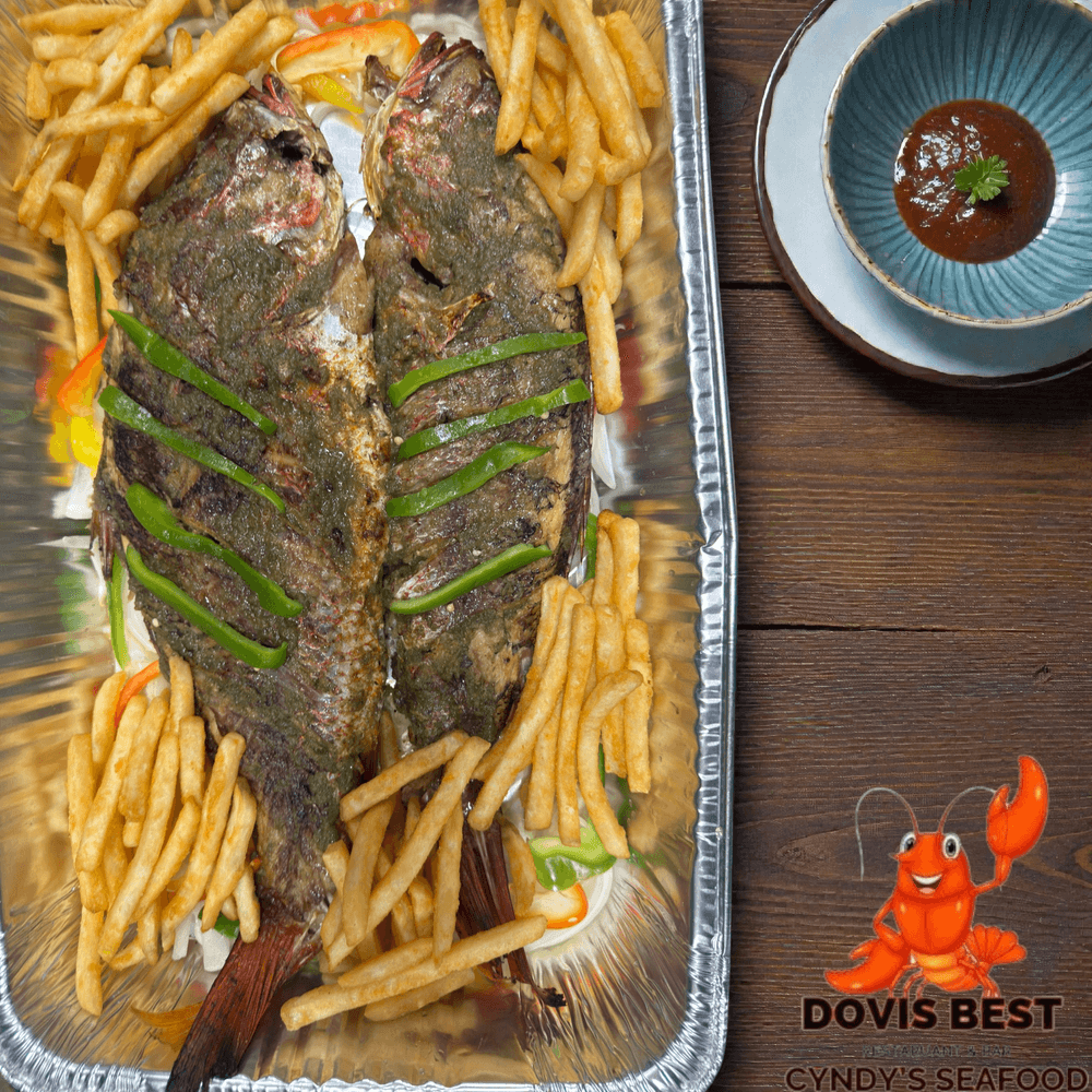 Grilled Red Snapper with Fried Plantains, French Fries or Jollof Rice