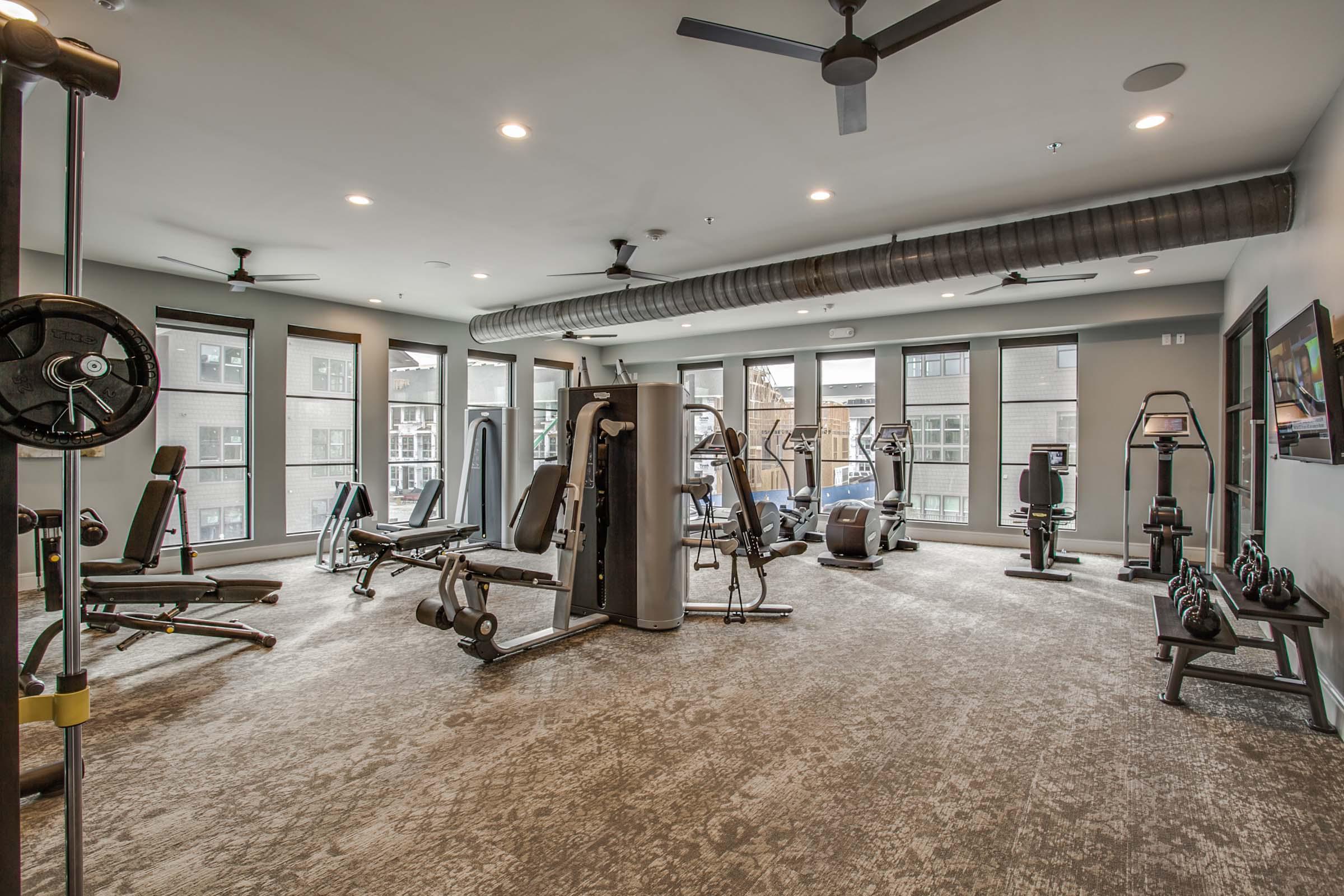 Villas 24-hour fitness center with strength and cardio equipment