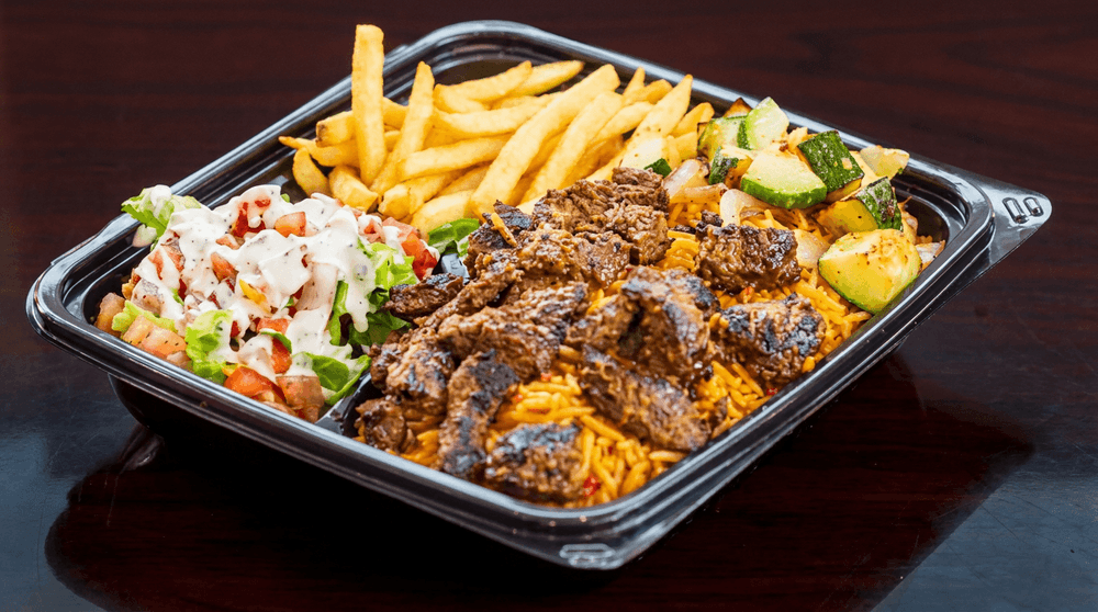 Steak Tips Over Rice