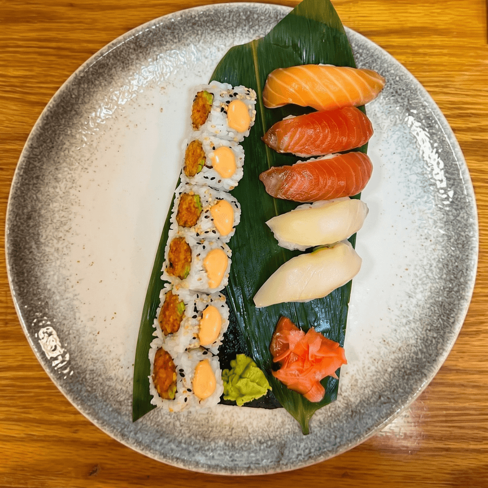 Nigiri Sushi and 1 Spicy Salmon or Spicy Tuna Roll