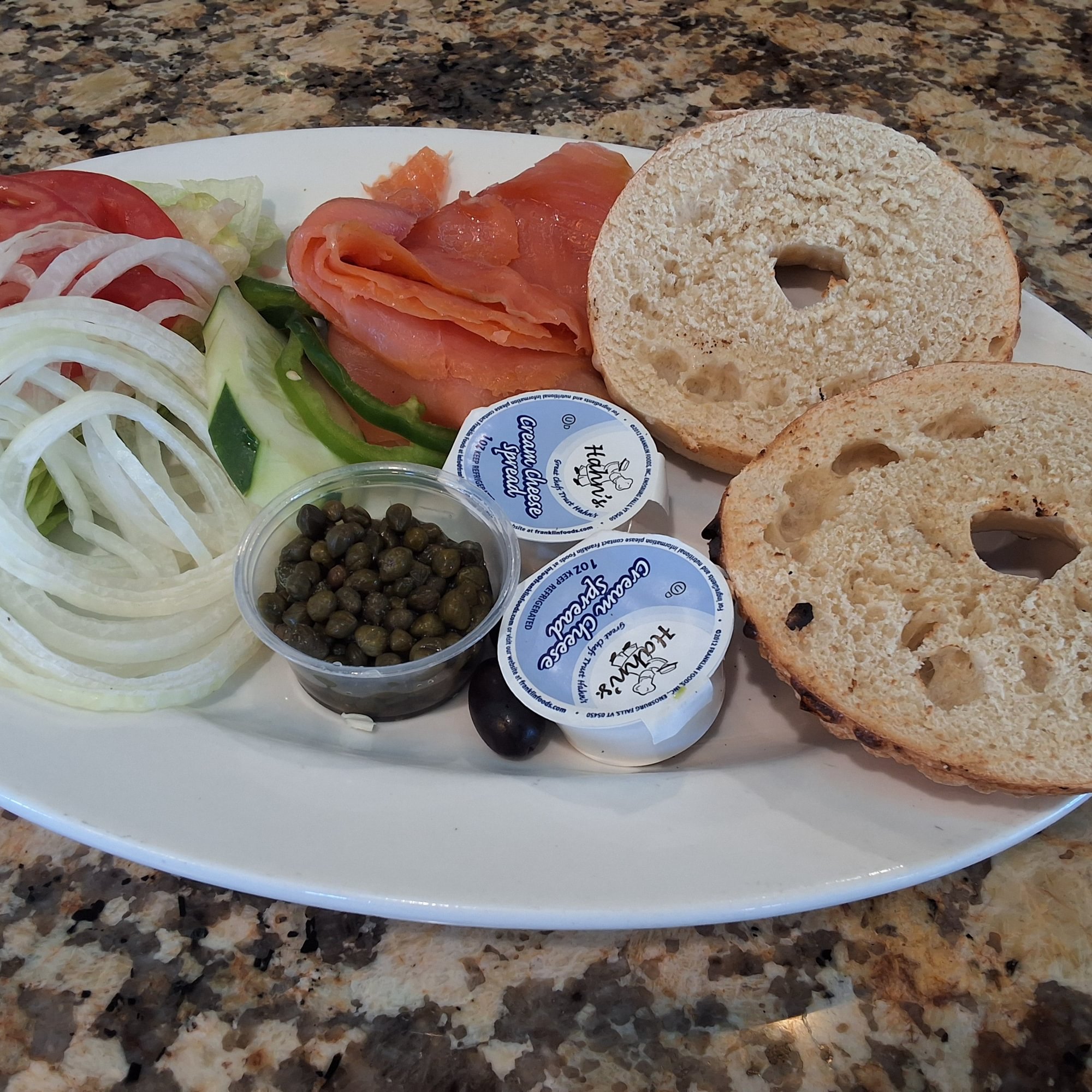 Bagel with Nova Scotia Lox, Cream Cheese, Lettuce, Tomato & Onion