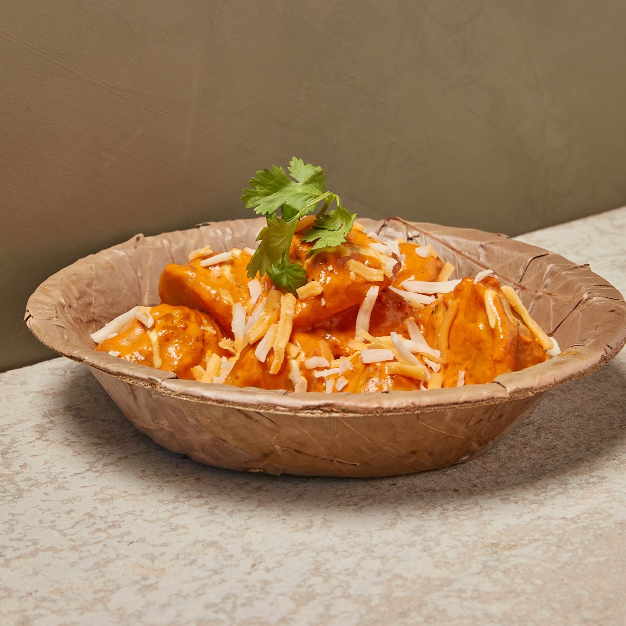 BUTTER MASALA MOMO