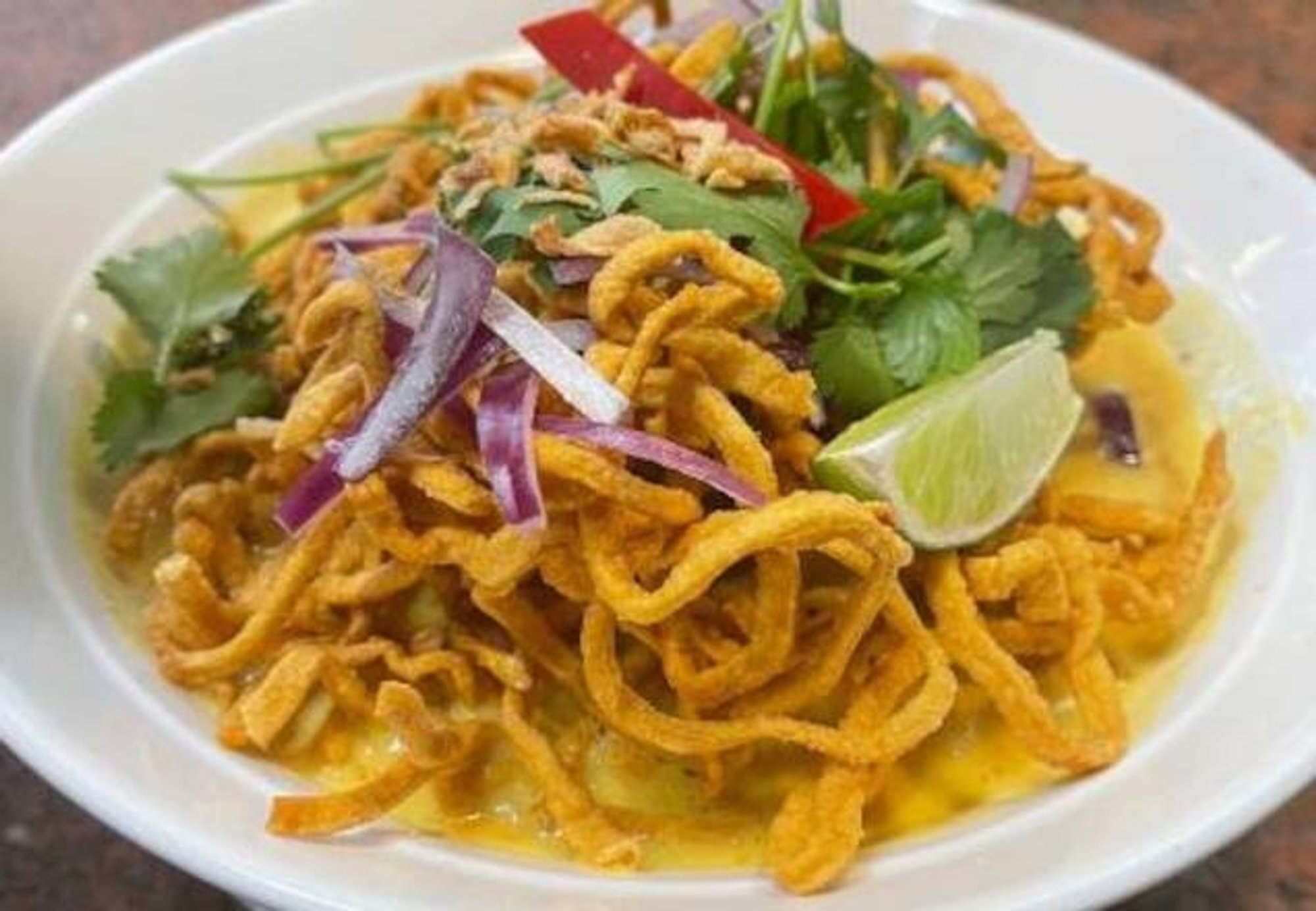 Khao soi with chicken drumstick