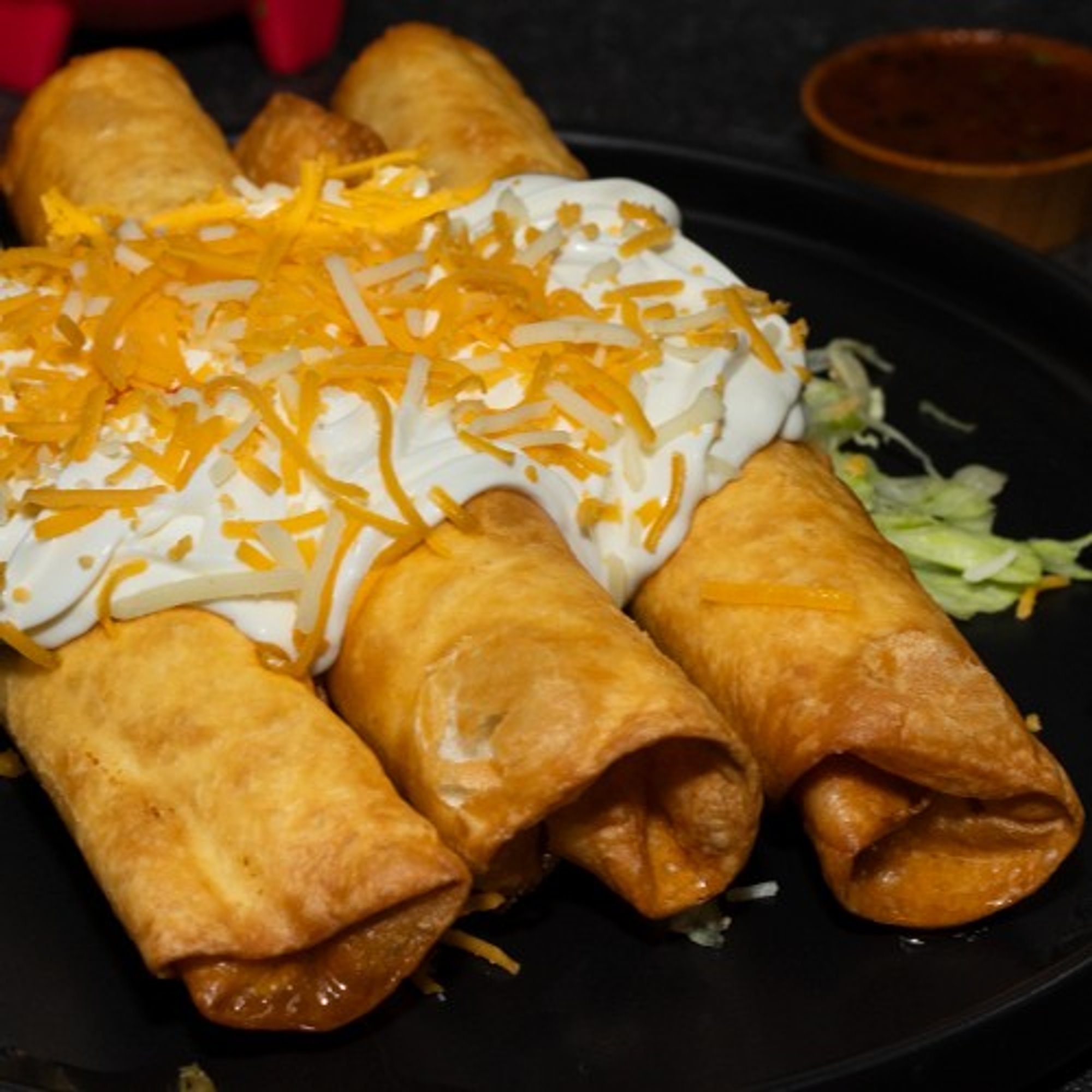 3 Flautas with Sour Cream Plate