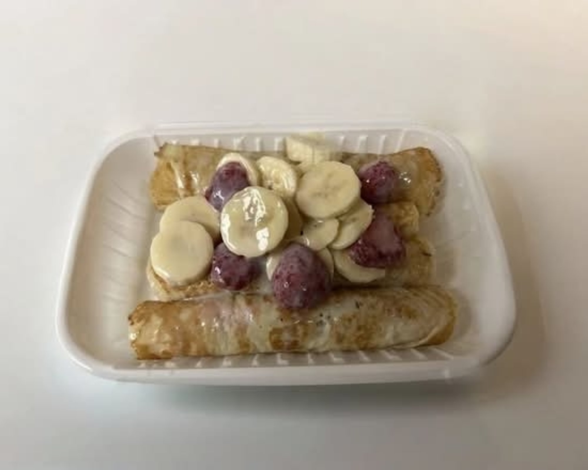Strawberry Banana Topped Stuffed Crêpes