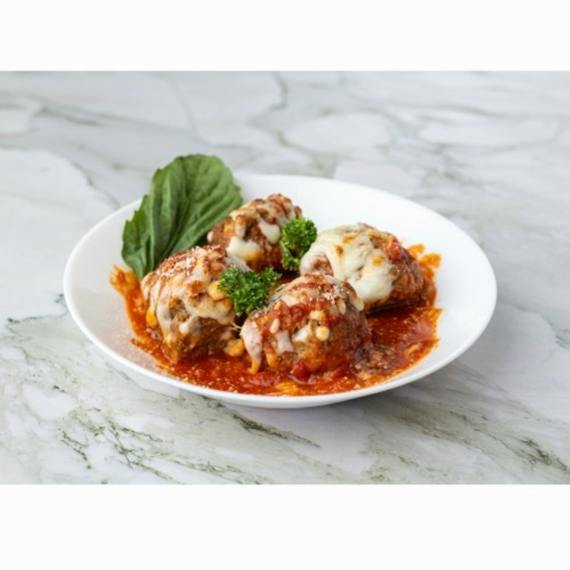 Baked meat balls with mozzarella