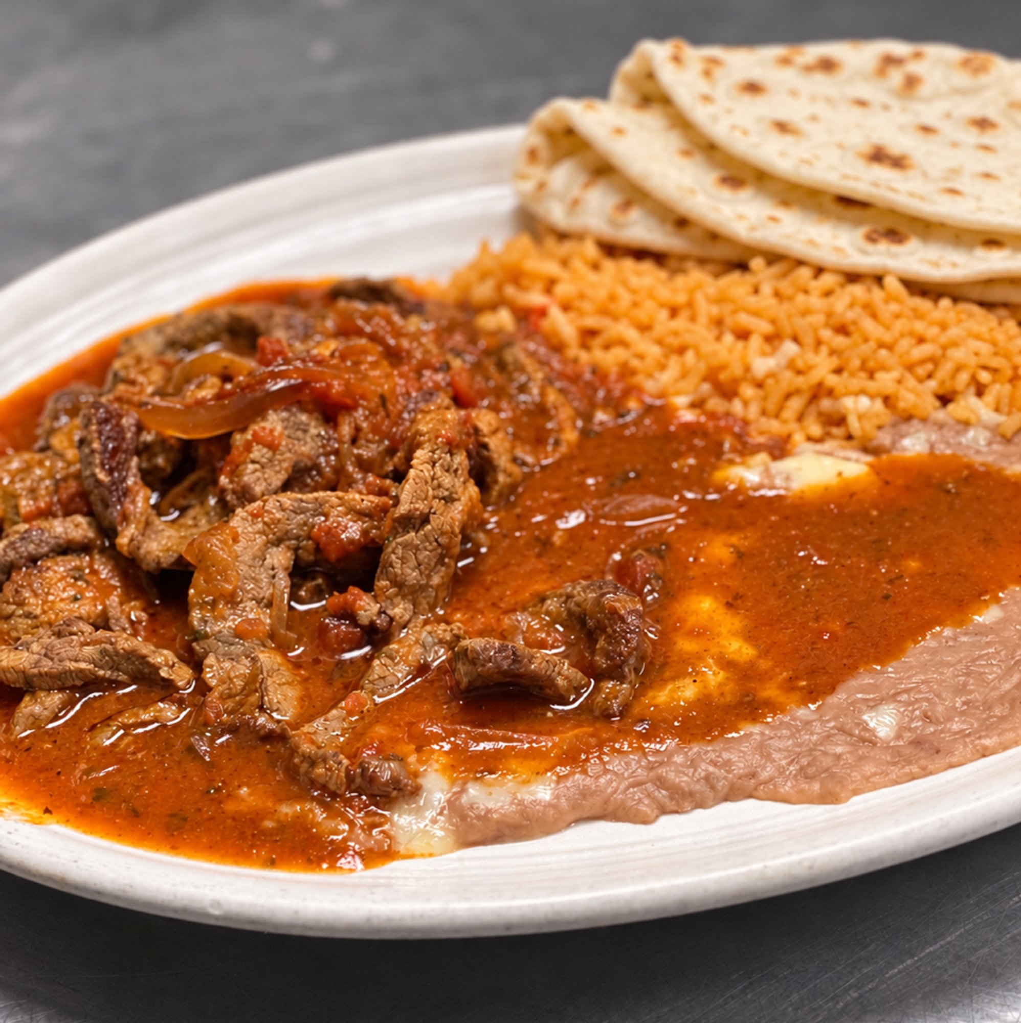 Bistec en Chile Rojo