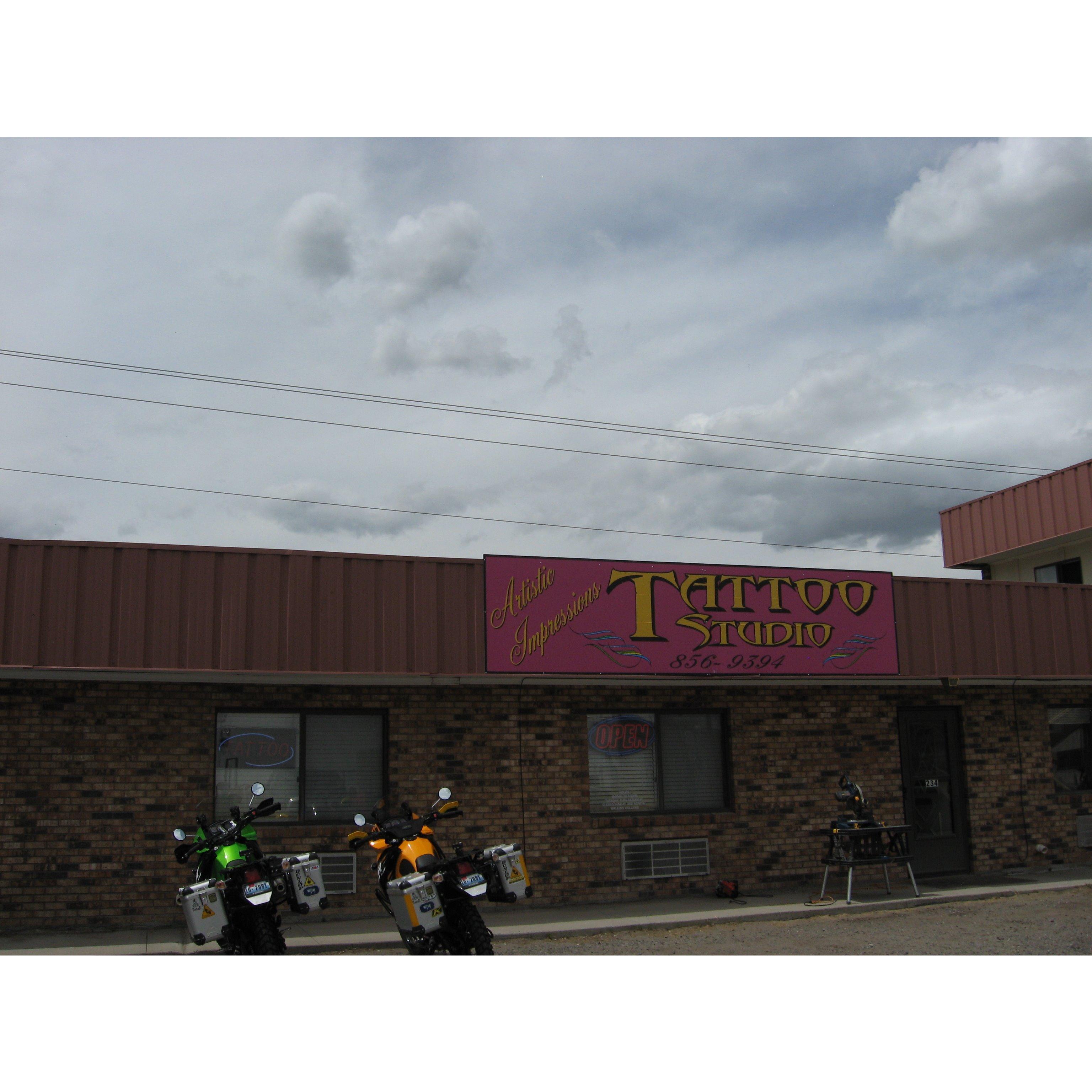 Artistic Impressions Tattoo Studio &amp; Vapor Corner Logo