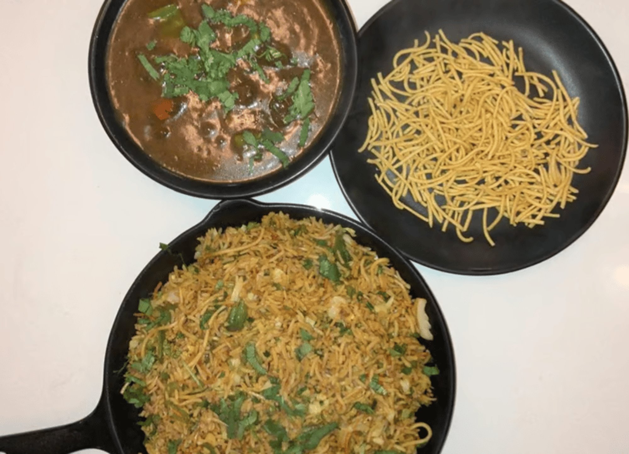 Triple Schezwan Fried Rice (Includes Veg Manchurian Gravy)