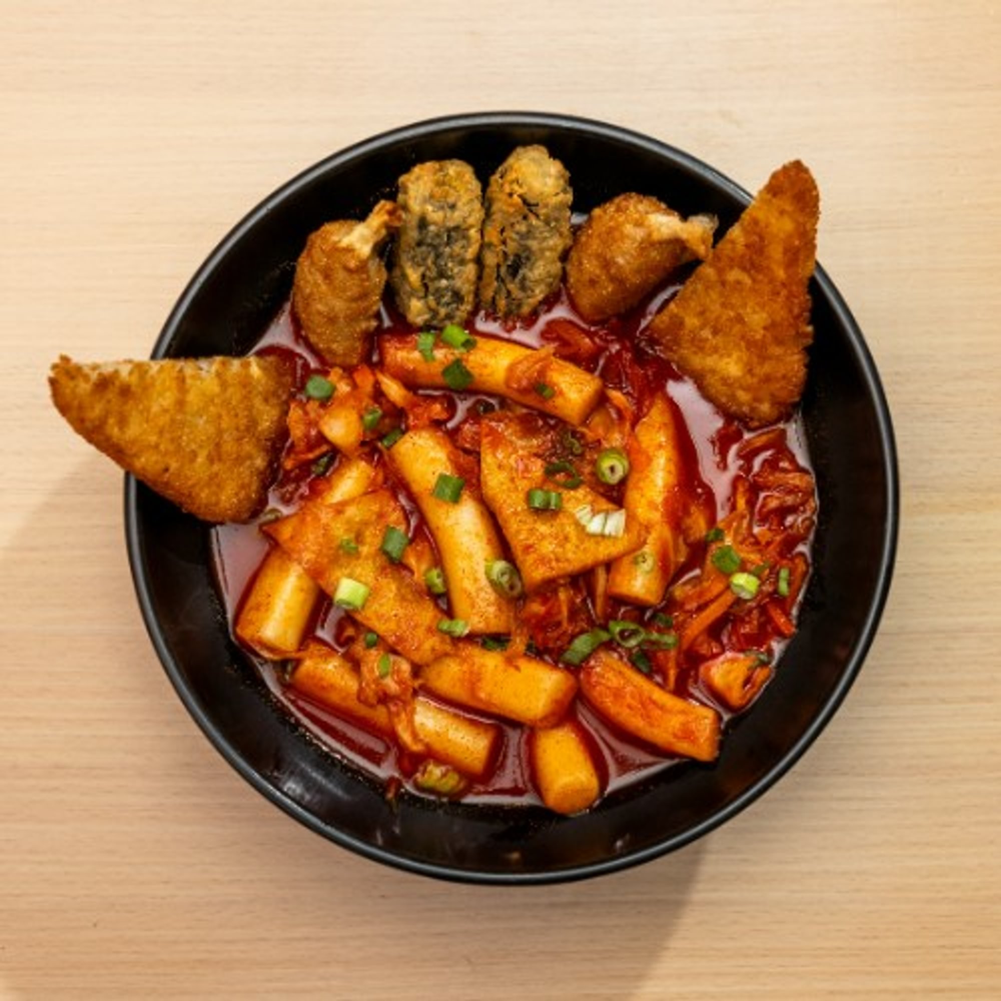 9. Tteok-bokki (Korean Rice Cake Dish - Original Spicy)