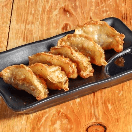 Fried Gyoza Dumplings with original Yuzu sauce (6 pieces)