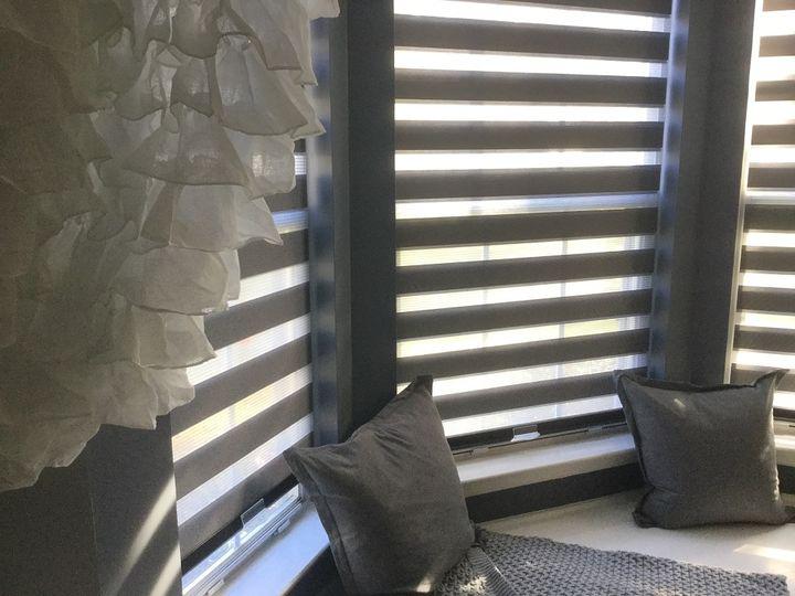 Enjoy your cozy reading getaway in Phillipsburg, NJ without worrying about damaging UV light or bothersome glare. Our Transitional Shades by Budget Blinds of Phillipsburg protect your furnishings while softening light for the ultimate reading experience.