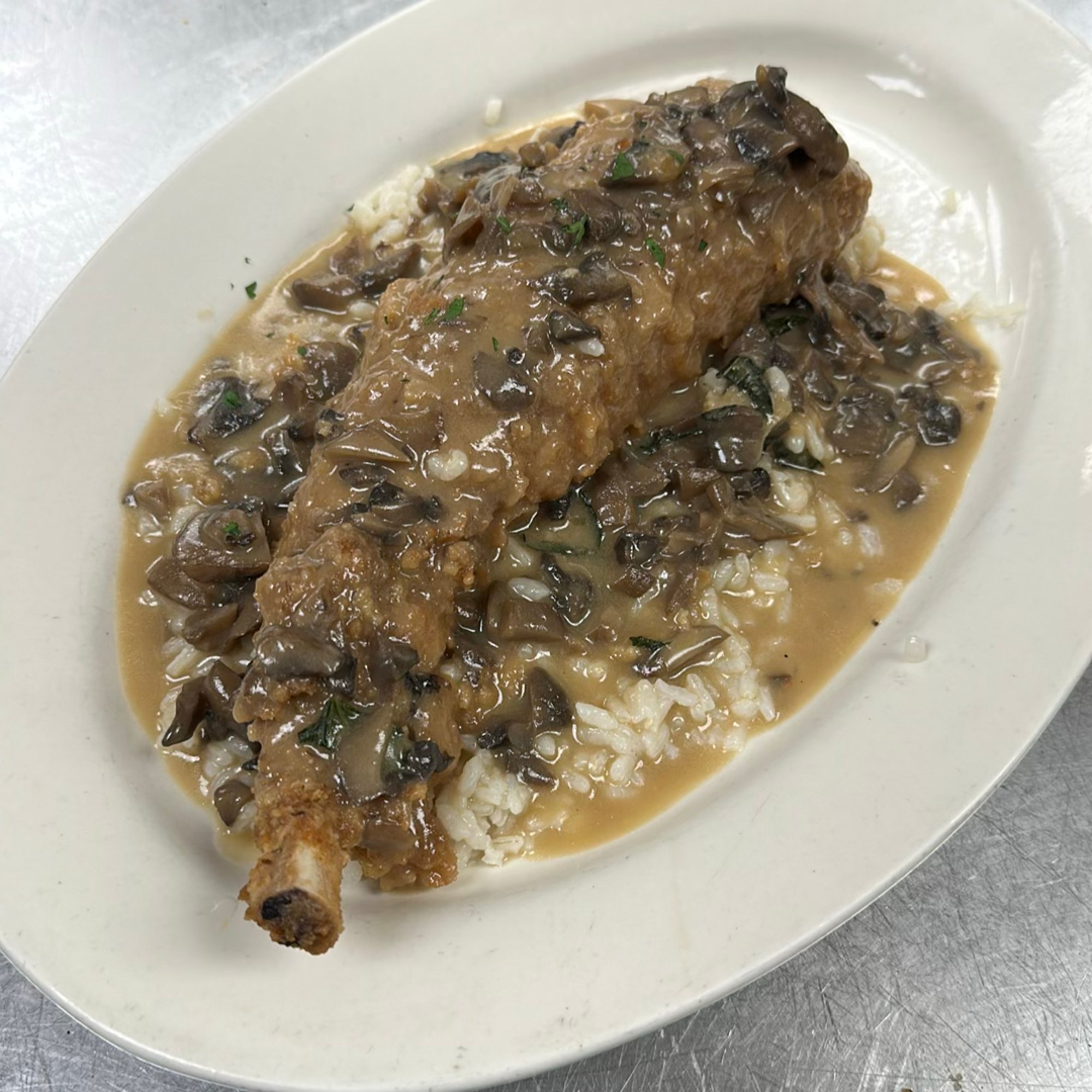 Stuffed Pork Chop Over Risotto