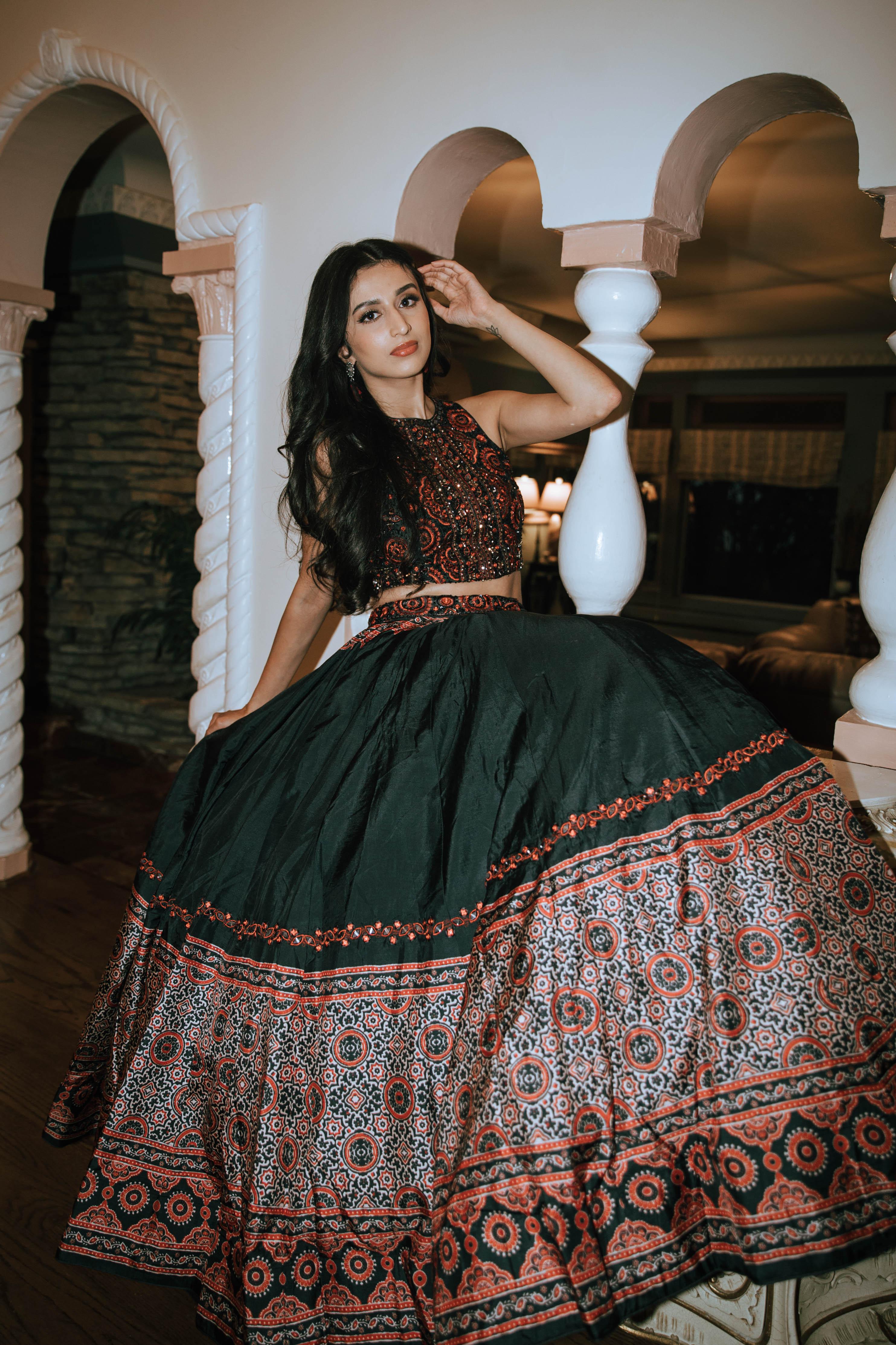 Raas The Global Naari Logo