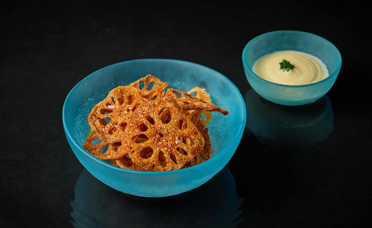 Addictive lotus crisps with truffle  ponzu mayonnaise