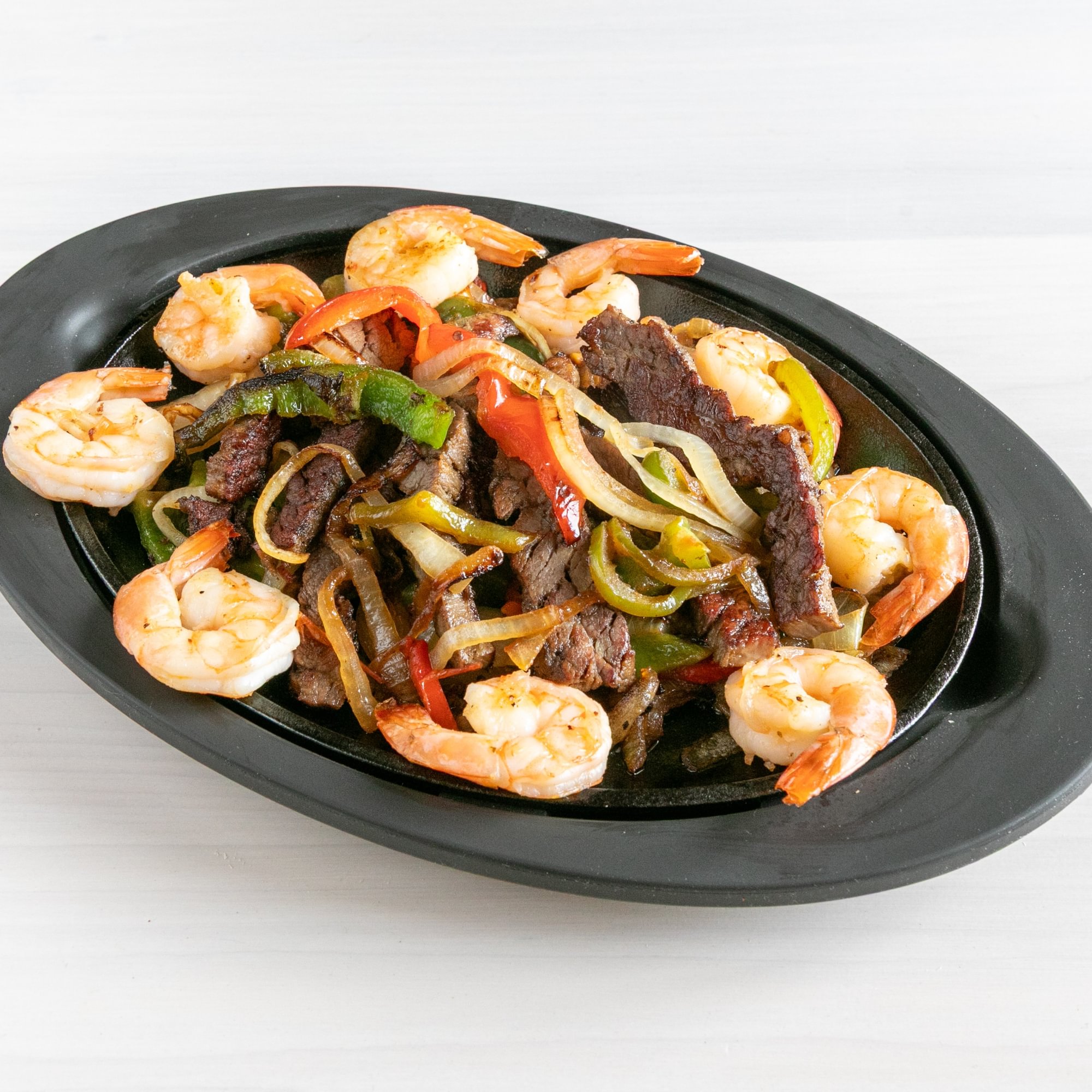 Combination Chicken, Beef and Shrimp Fajita