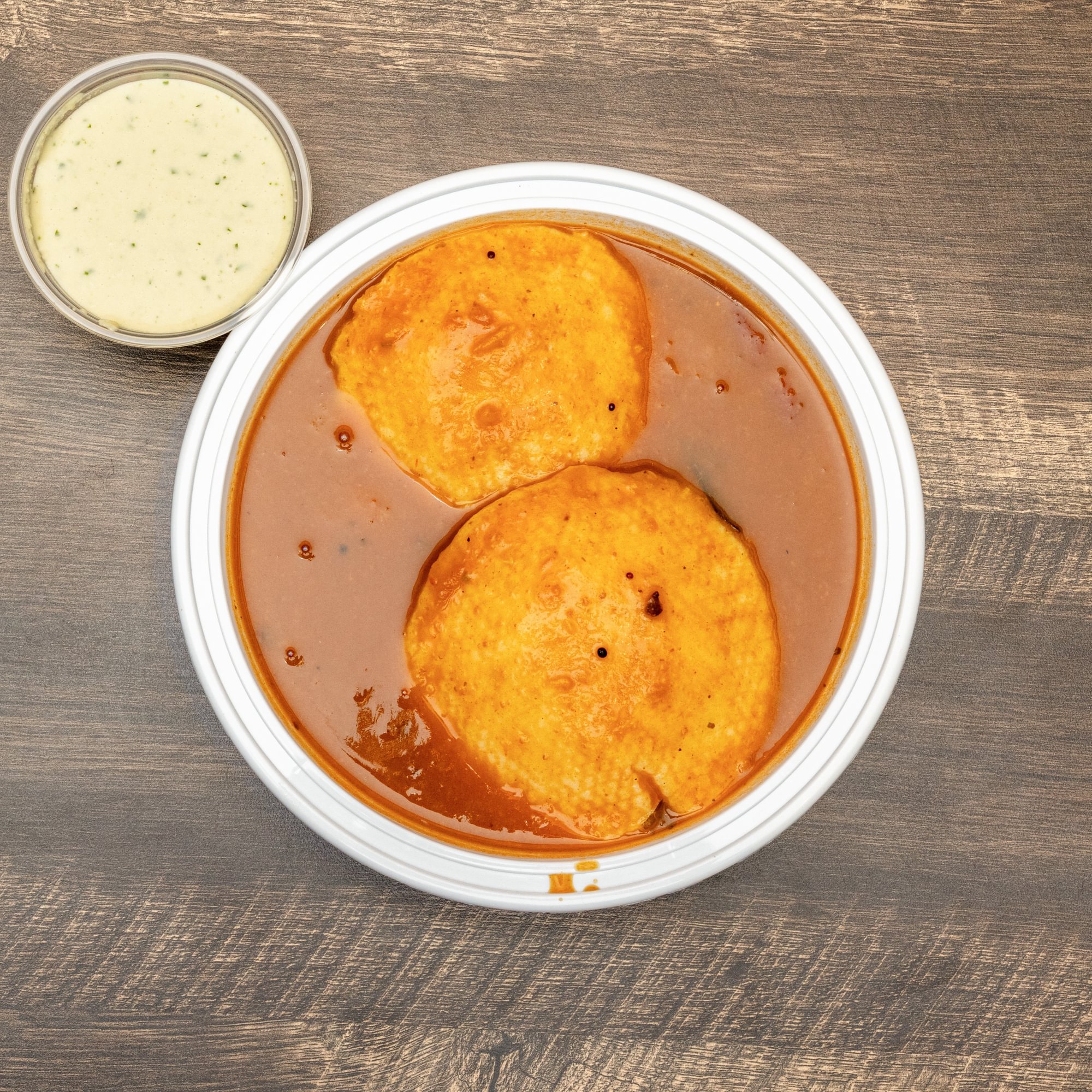 Idli in Sambar- 2Pc's (Comes with Chutney)