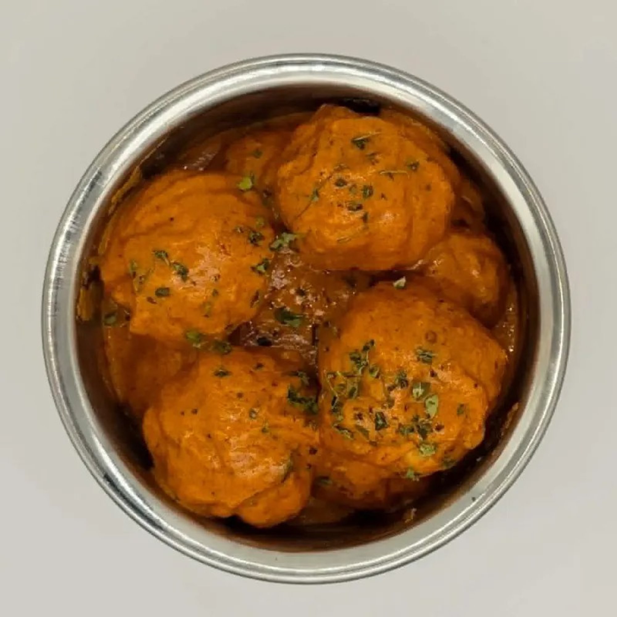 Chicken Momo Butter Masala
