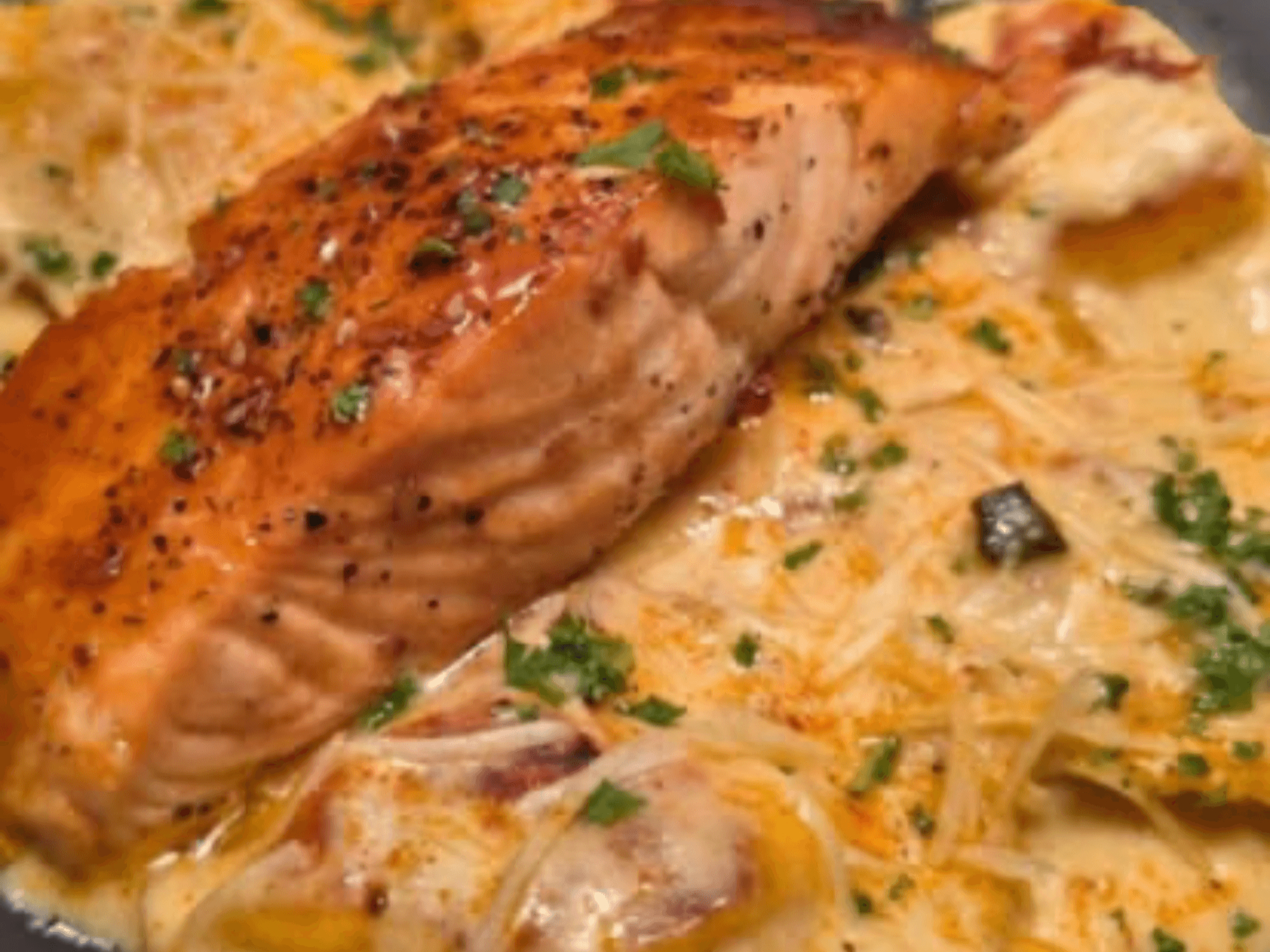 Yaki Glazed Salmon Over Cajun Cheese Raviloi