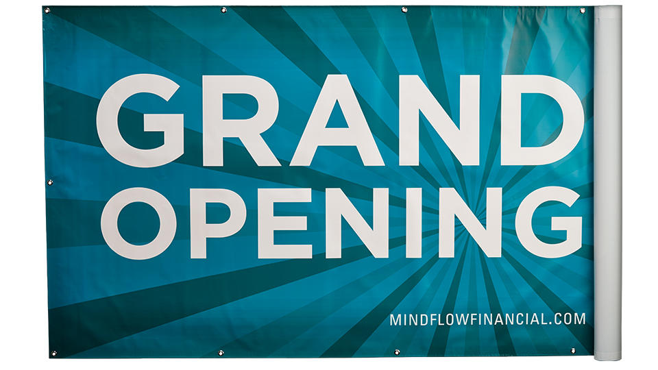 Rolling out grand opening banner on white background