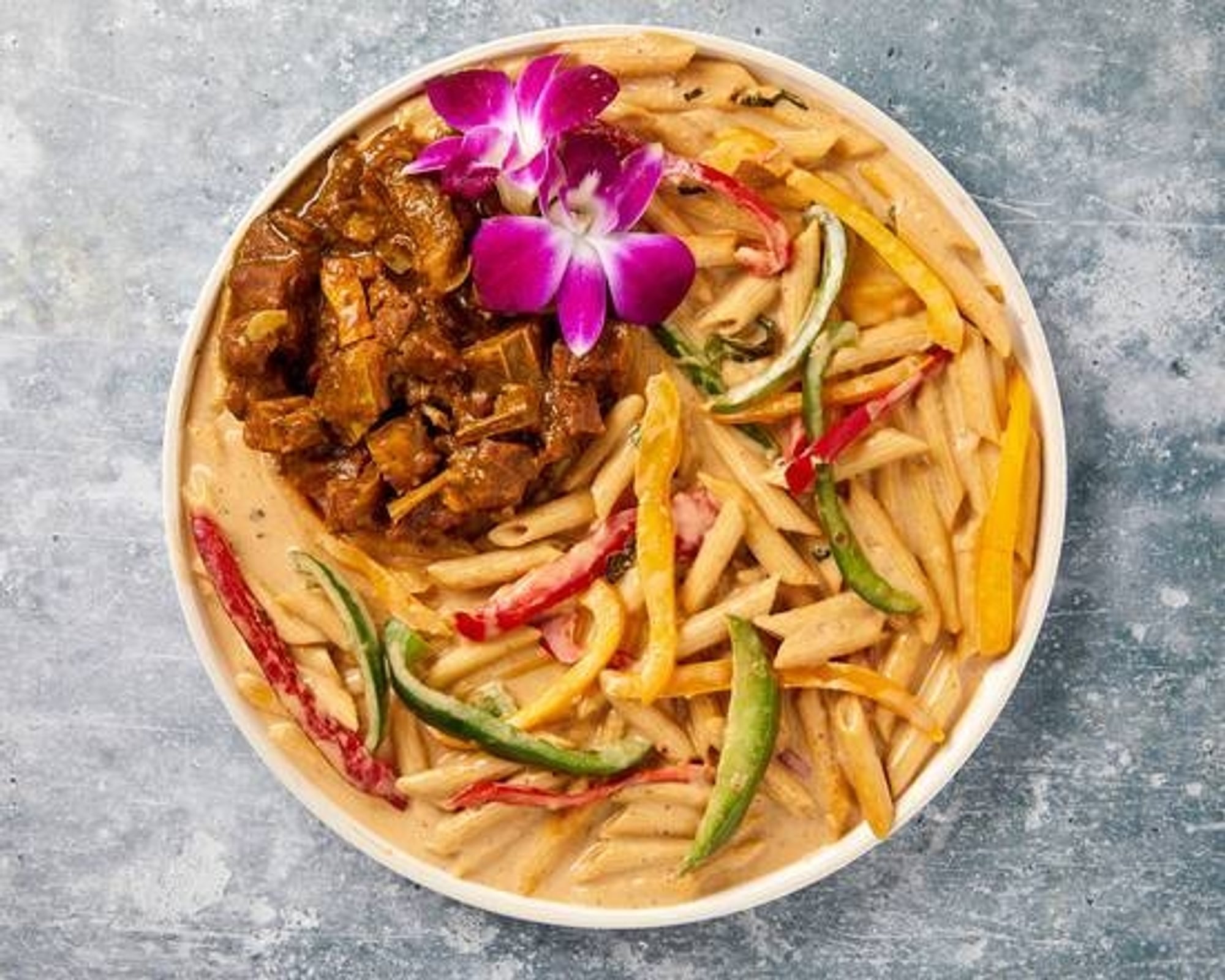 Rasta Pasta with Curry Goat