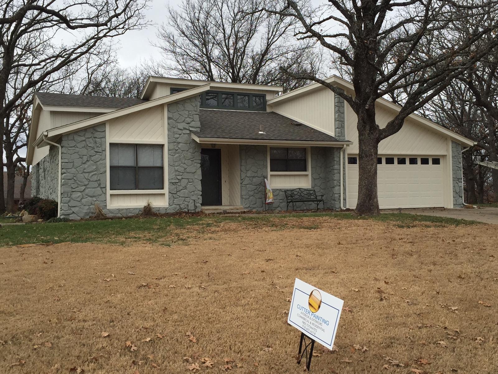 Finished product of exterior with painted sand stone rock