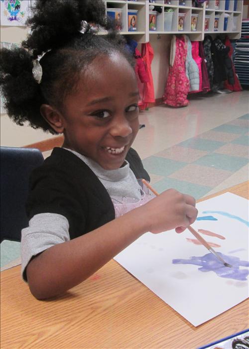 We love seeing our children engaged in art exploration.