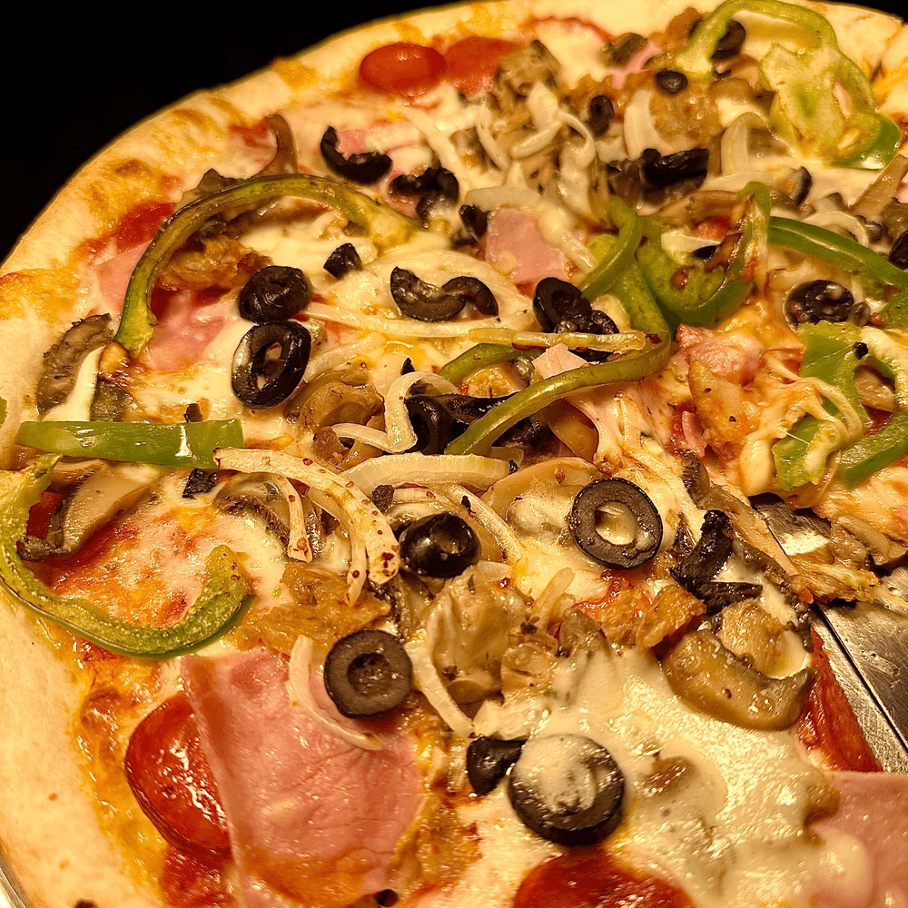 2 Slice Specialty Pizzas + 16 Oz Soda