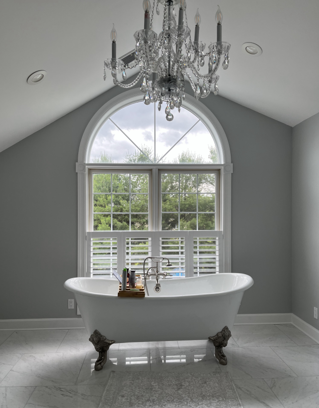 What could be better than a claw-foot tub and crystal chandelier? Well, to enjoy this space to the utmost, you'll need privacy! Our CafeÌ Shutters offer plenty of privacy-and a great look!