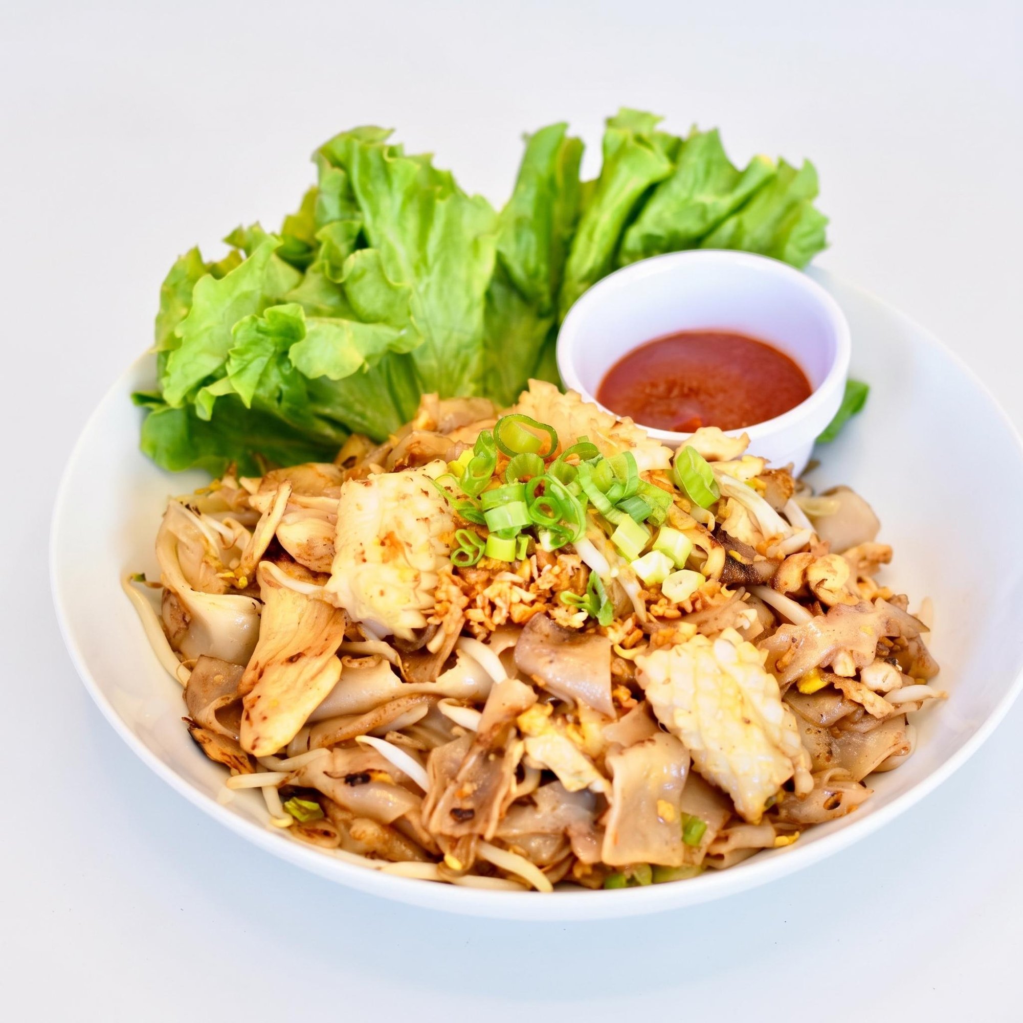 Kua Kai [Stir-Fried Noodles with Chicken and Squid]