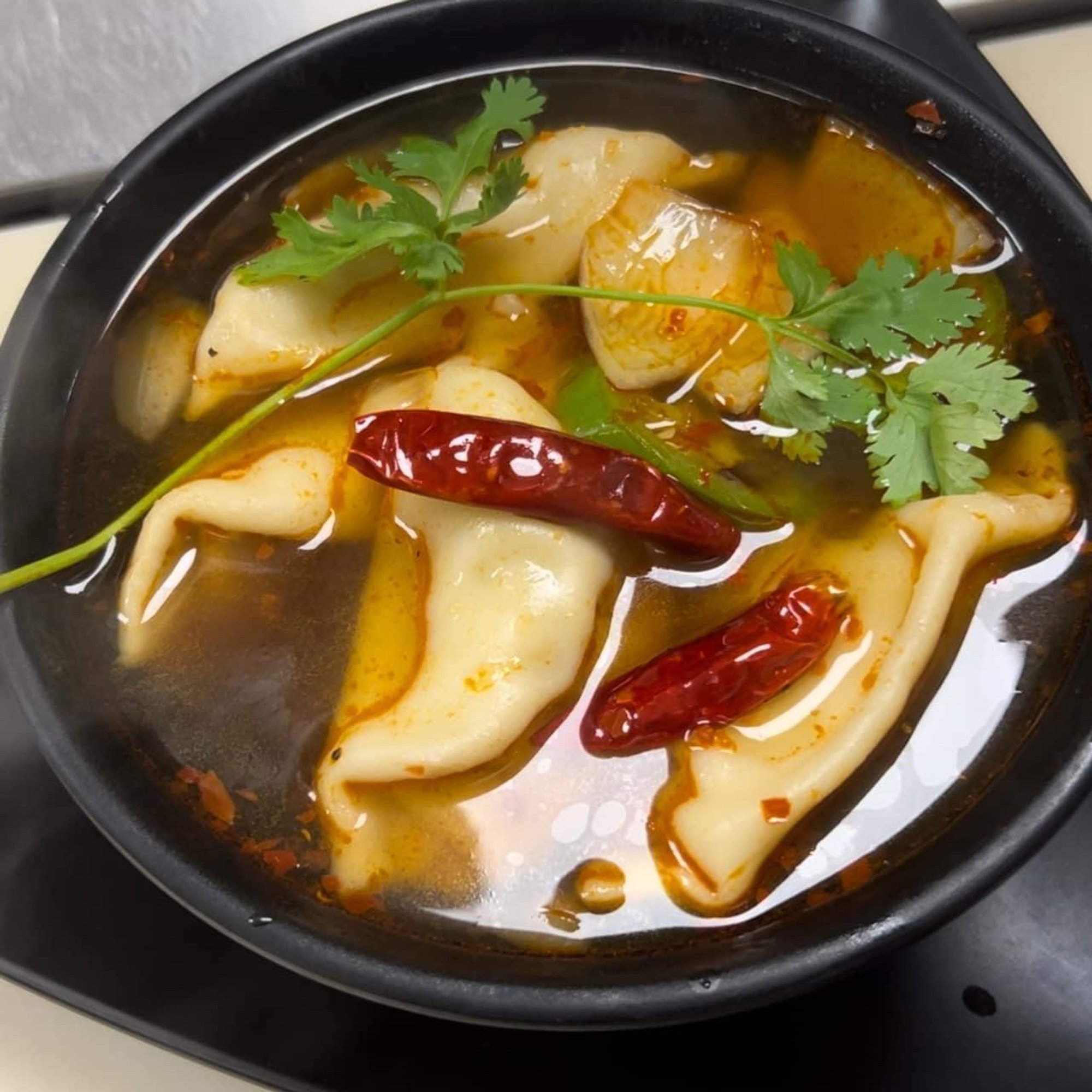 A13. Spicy Dumplings Soup