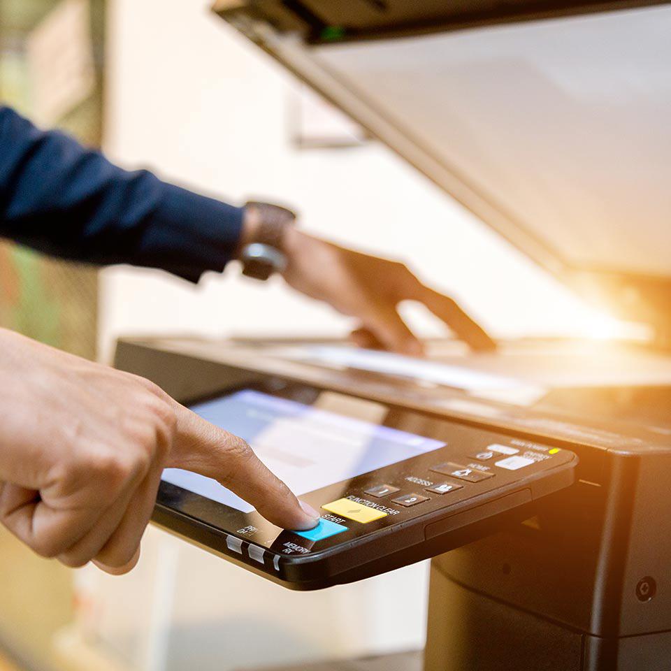 A business person scanning an important document at The UPS Store