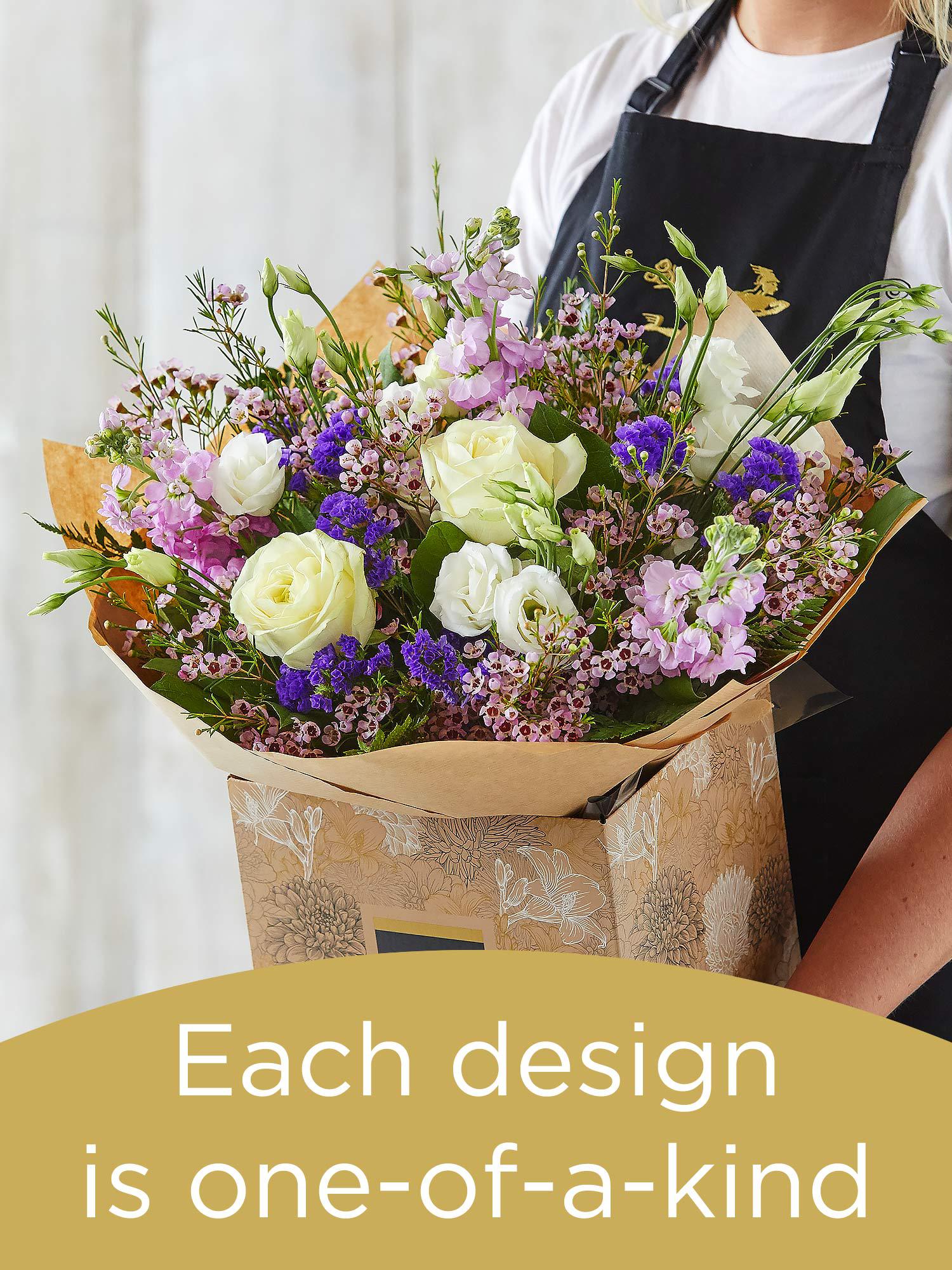 Hand-tied bouquet made with seasonal flowers