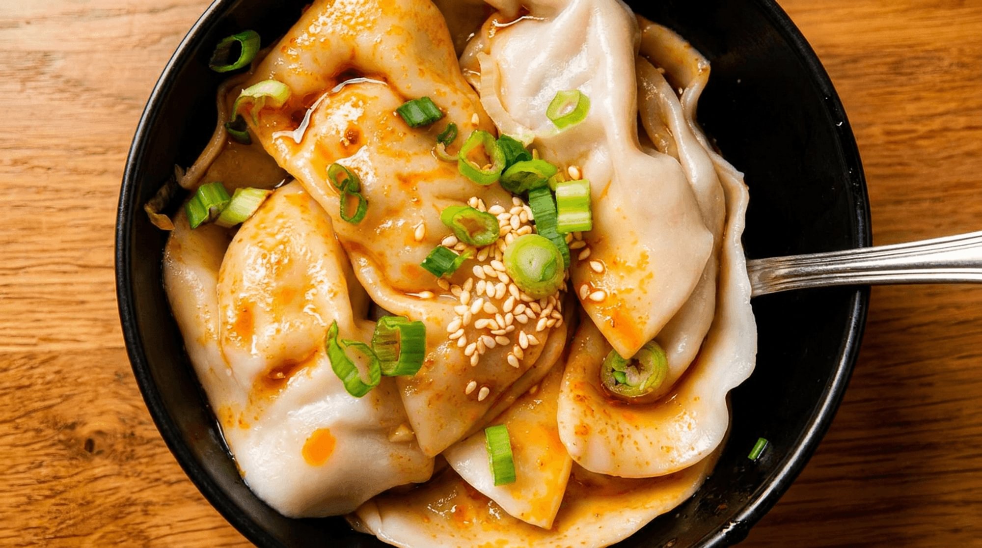 Dumplings in Chili Oil (8pc)