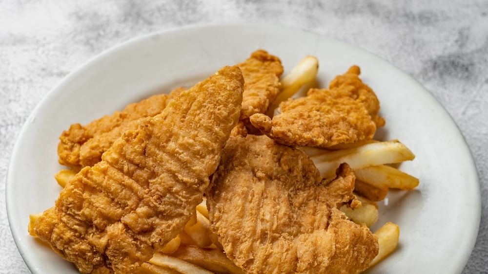 Deditos De Pollo Con Papa Fritas