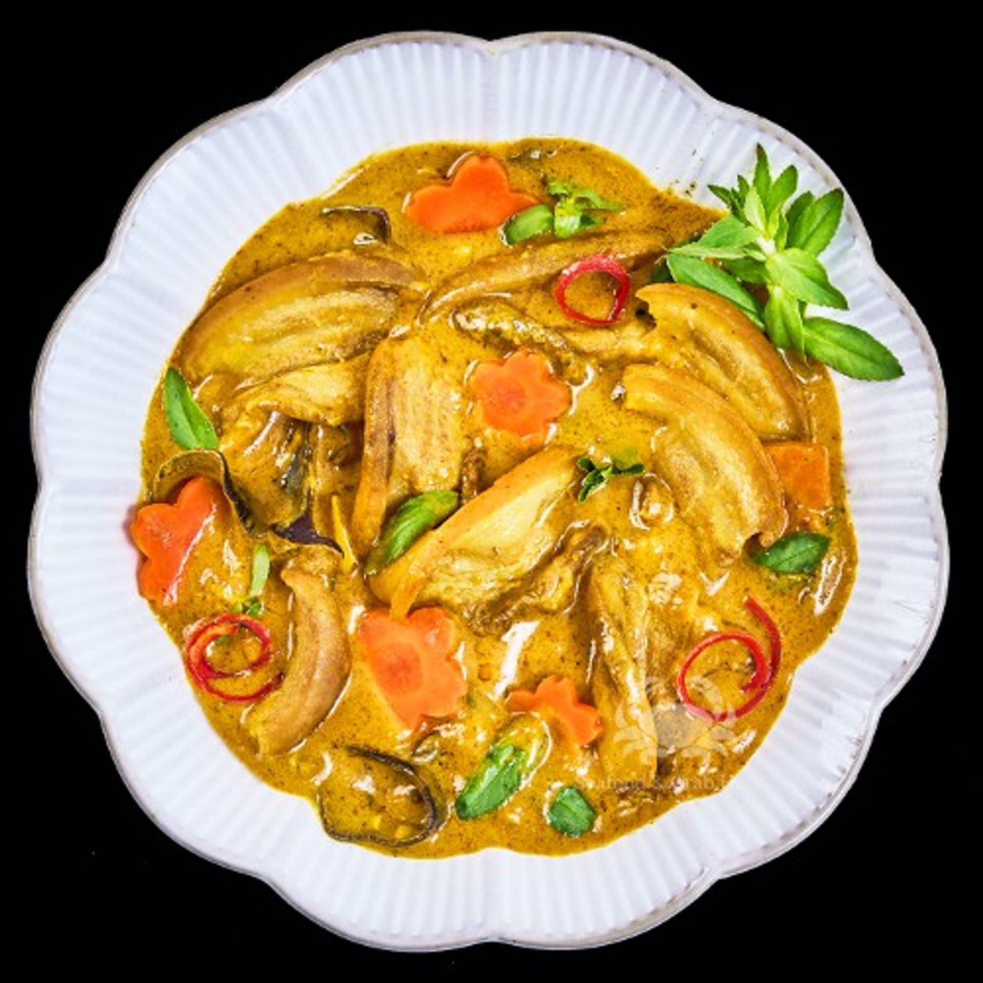 Dê Xào Lăn / Sautéed in Curry, Turmeric, and Coconut Milk