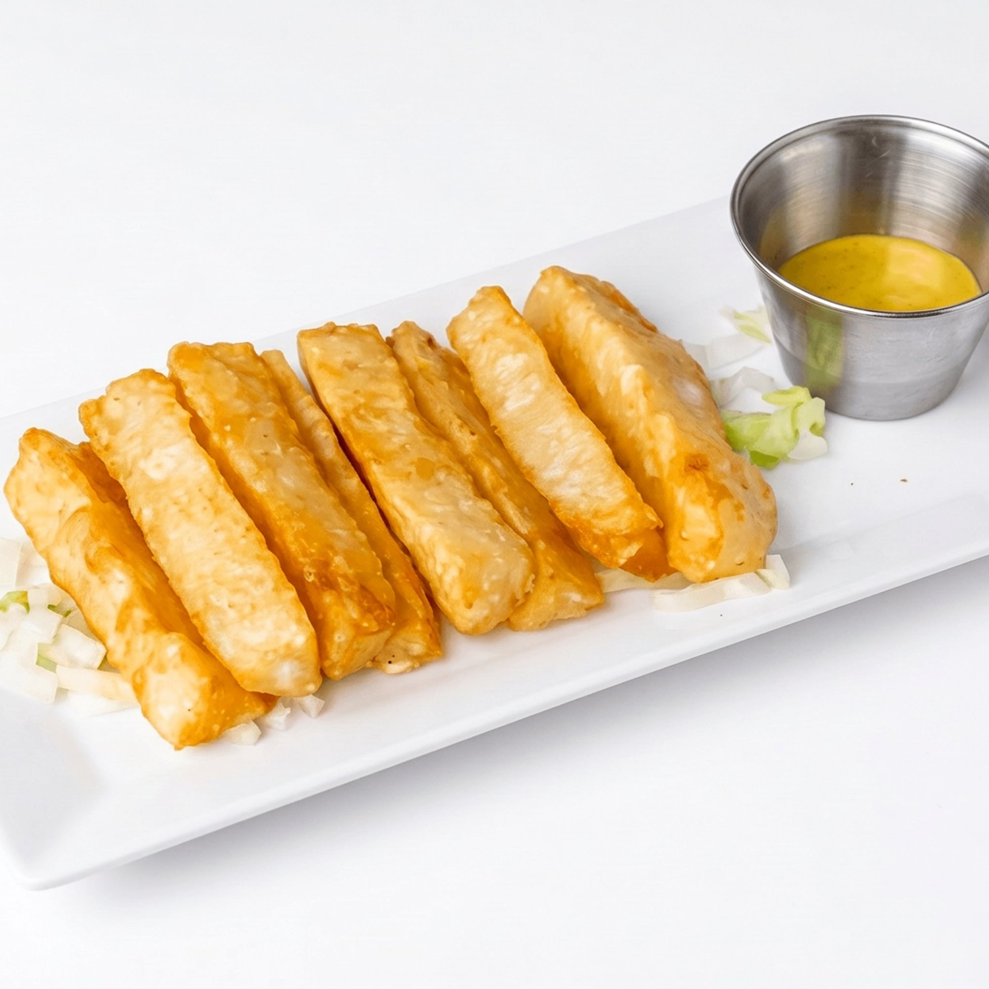 Yuca a la Huancaína [Cassava in Creamy Pepper & Cheese Sauce]