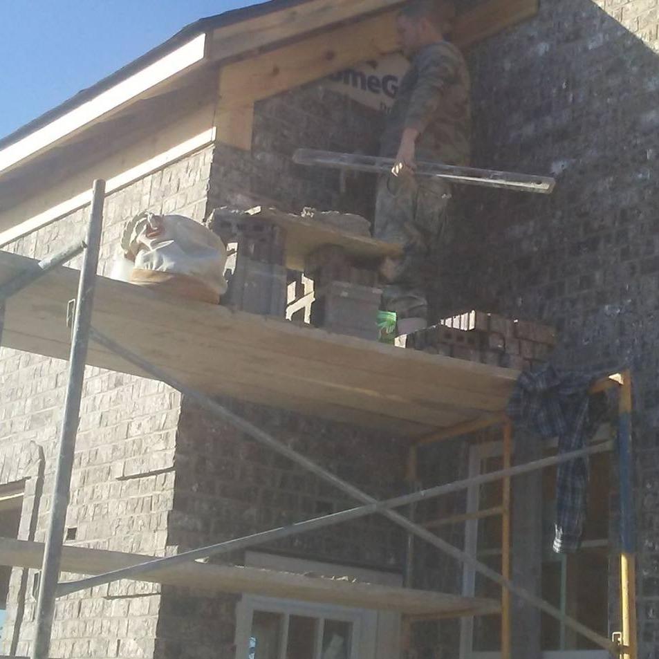 Thompson's Masonry Logo