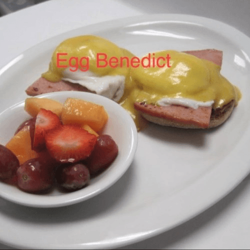 Ham Benedict with fruit cup