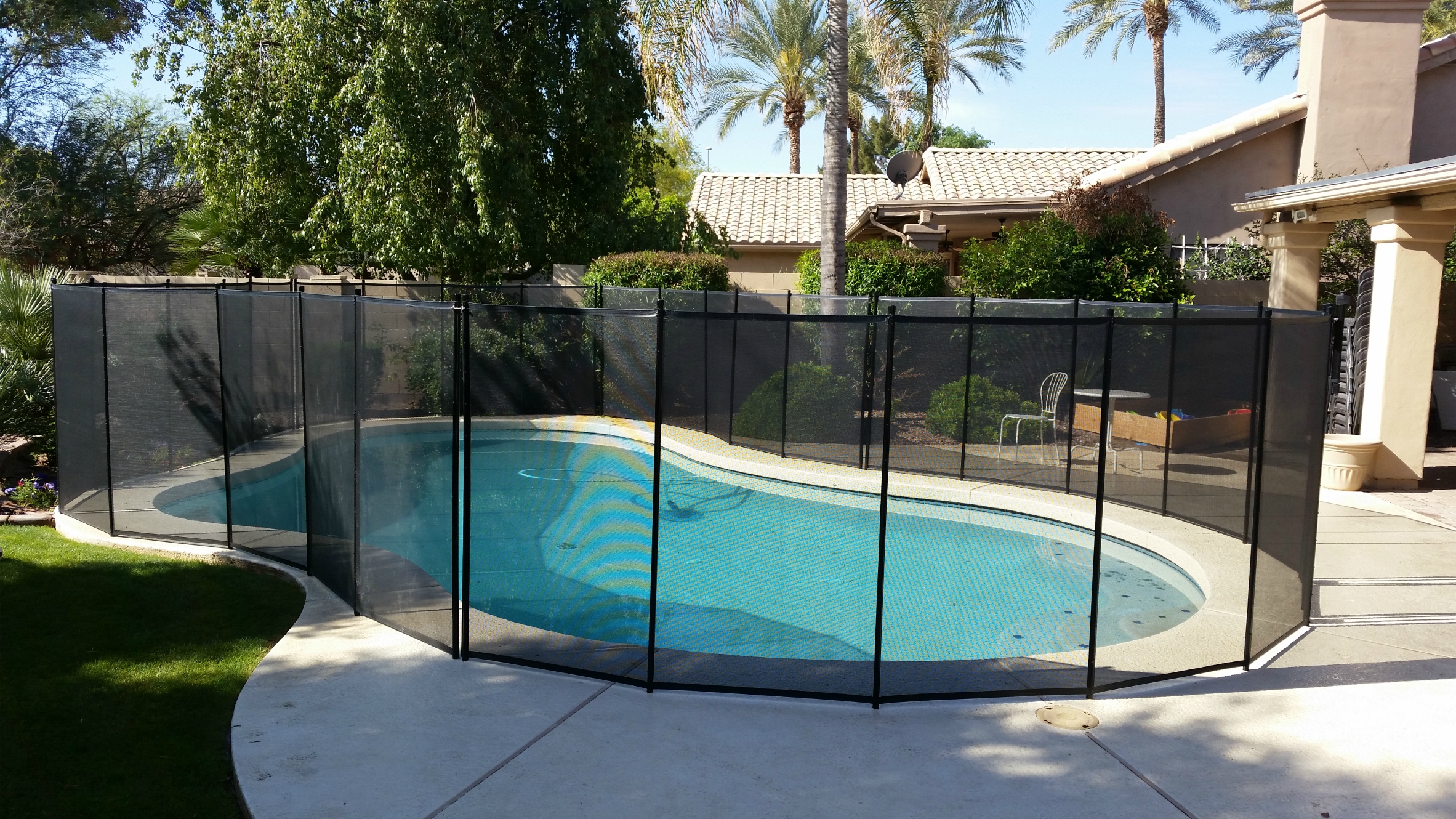 Katchakid removable pool safety fence in Jet Black.