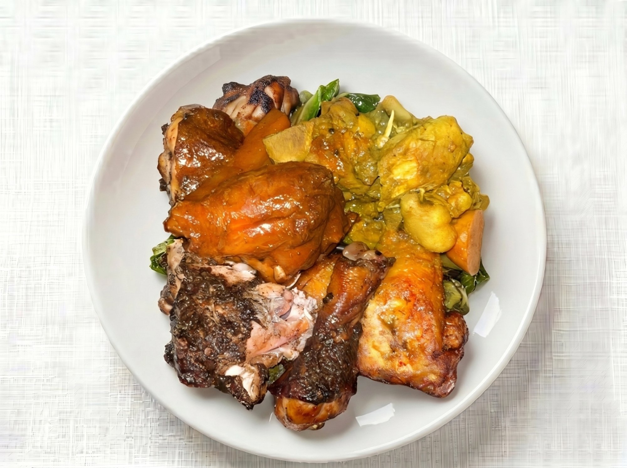 Jerk, Curry, and Brown Stew Chicken Sampler
