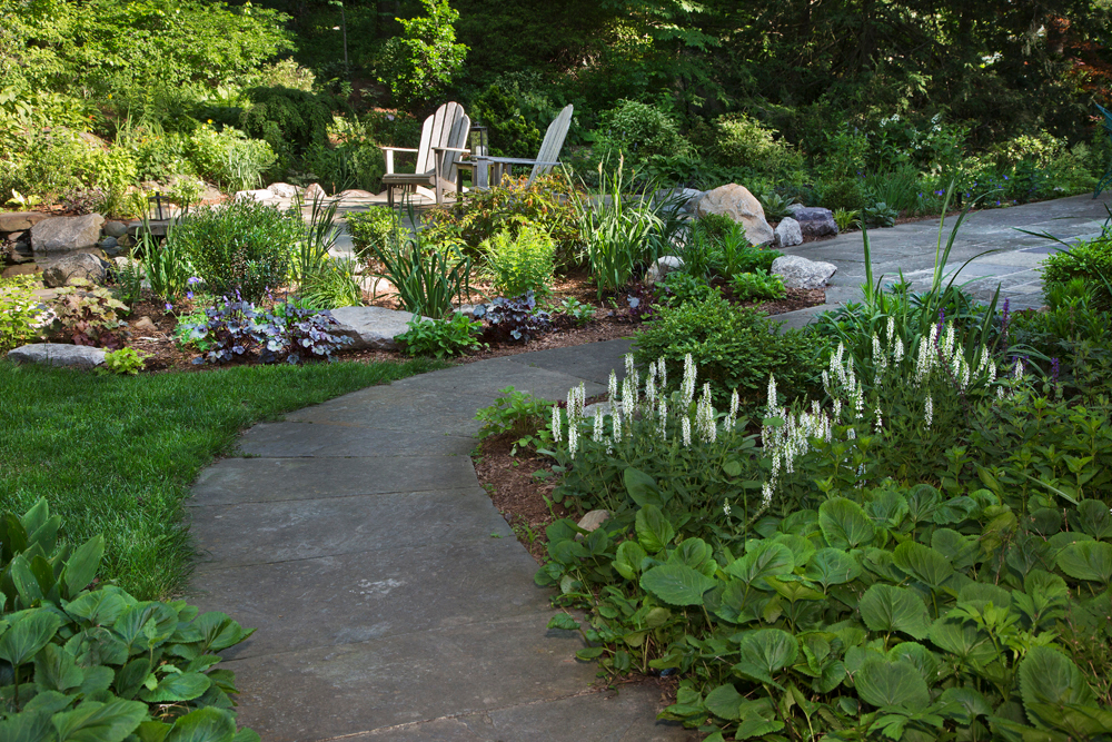 Part-sun perennial garden and front path