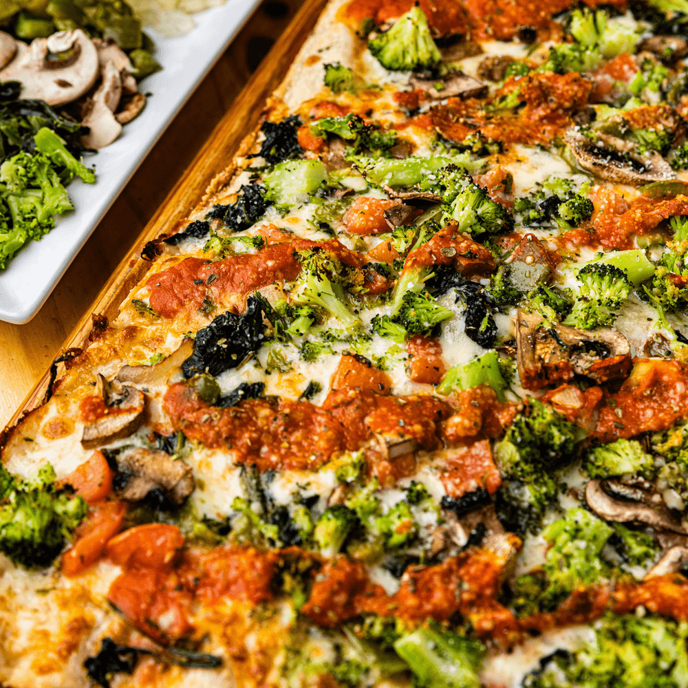 Broccoli & Roasted Garlic Deluxe Pizza